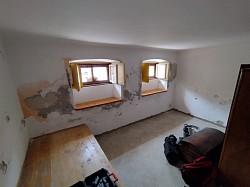Restoration of stone walls and moisture treatment