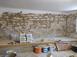 Restoration of stone walls and moisture treatment